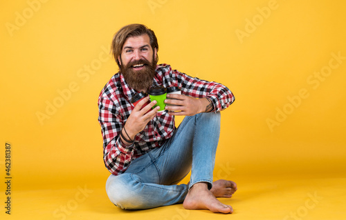 drinks for friends. good morning. morning vibes at home. concept of inspiration. hipster man drink coffee. handsome bearded man holding a white cup. mug with beverage. drinking tea or coffee © be free