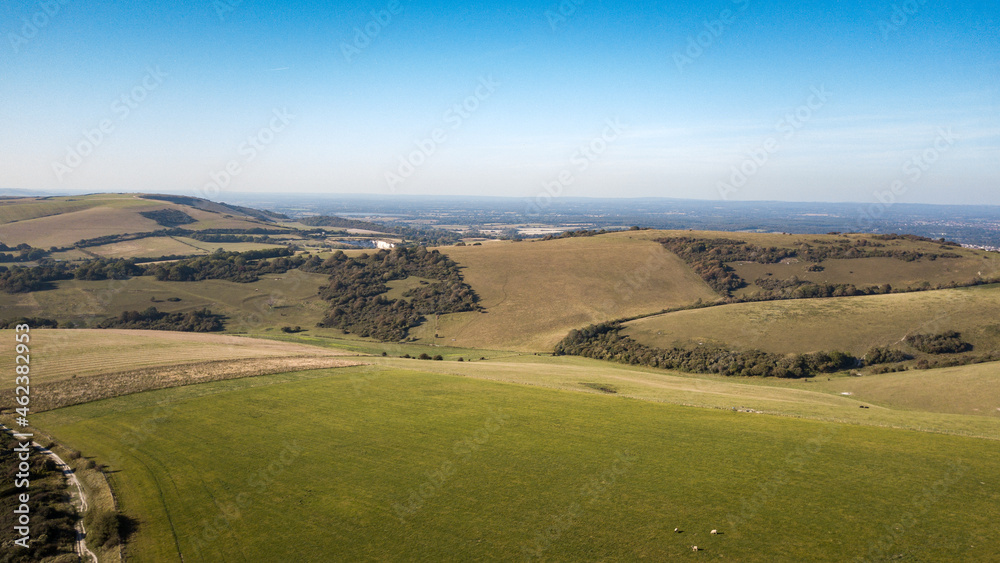 South Downs, Sussex, England. An elevated view of the rolling landscape of the Area of Outstanding Natural Beauty (AONB) on the British south coast.
