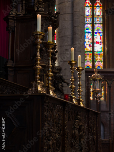 Candle holders in medieval church photo