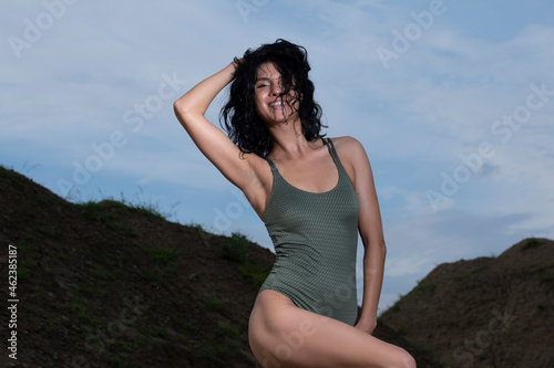 Beautiful slim body of woman. Fit sporty woman body. Fitness. Travel. Sexy photo. Sexy. Sensual.   © Erika