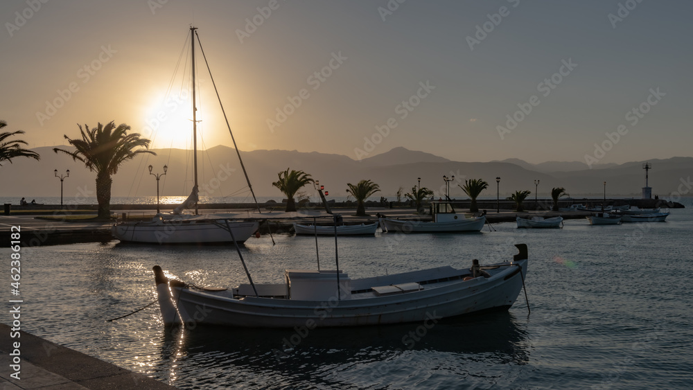 Fototapeta premium Evening on the embankment at the Nafplion lighthouse