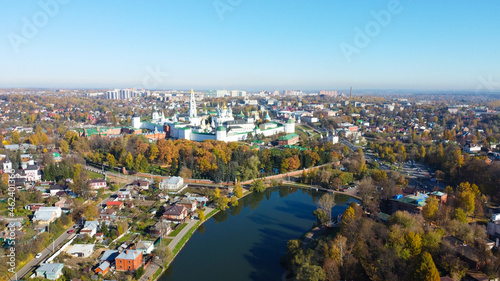 Fototapeta Naklejka Na Ścianę i Meble -  Sergiev Posad, Russia - 08 October 2021: Autumn view of the Holy Trinity Lavra of St. Sergius from a bird's eye view