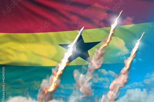 Ghana supersonic missile launch - modern strategic nuclear rocket weapons concept on blue sky background  military industrial 3D illustration with flag