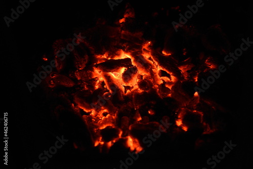 The embers of burning wood, wood burning in the fireplace.
