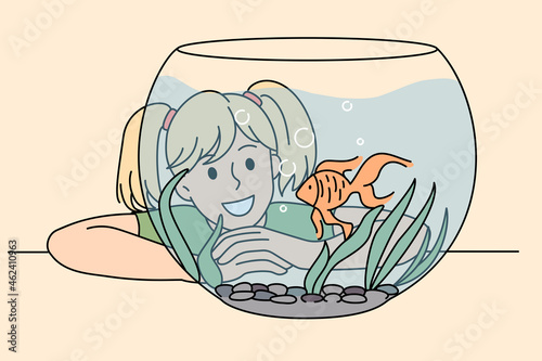 Happy smiling girl admiring golden cute fish in glass aquarium. Vector concept illustration of child happy moment with domestic pet.
