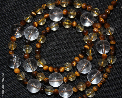 Beads made of natural stones  citrine  rhinestone and tiger s eye .