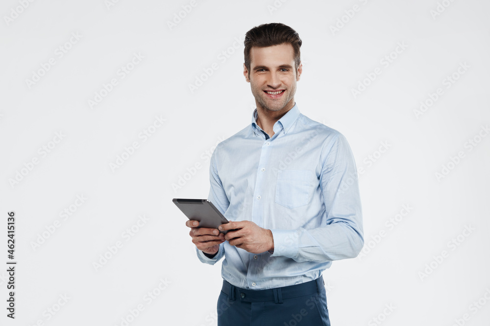 Smiling european business man hold digital tablet Smiling european business man hold digital tablet
