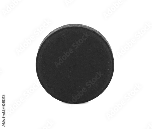 Activated charcoal pill isolated on white. Potent sorbent