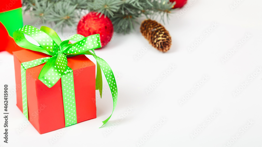 Holiday composition. Red Gift boxes and Christmas decorations on white background. Copy space.