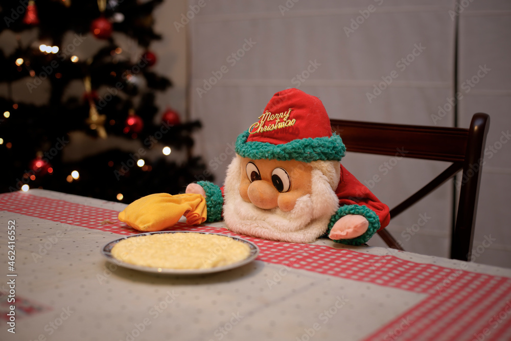 Santa's doll eating on Christmas Eve