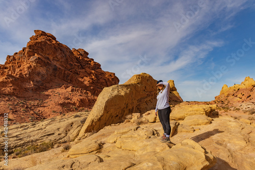 Girl looking out over Valley of Fire rock formations