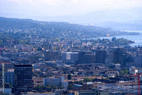 Panorama view over the City of Zurich with lake Zurich and Swiss alps in the background at a beautiful late summer day. Photo taken September 18th, 2021, Zurich, Switzerland.