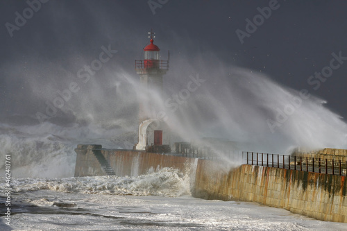 Winter sea storm at the old lighthouse