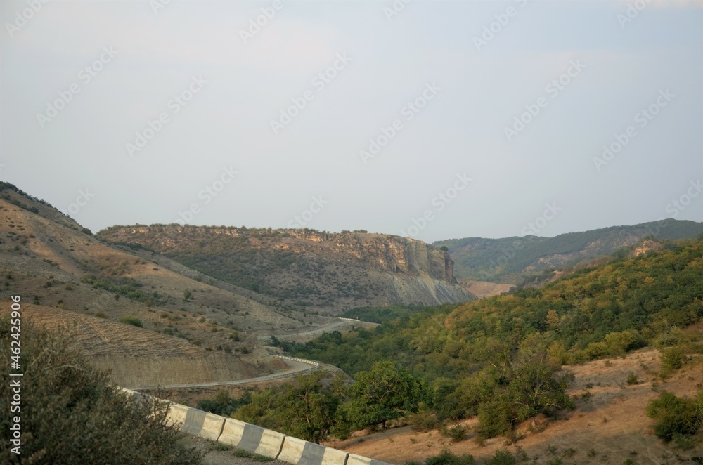Obraz premium The road between the mountains serpentine, travel