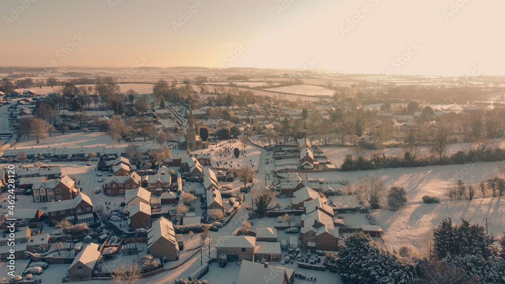 snowy village from drone