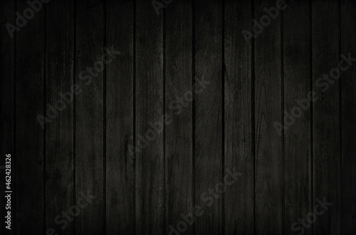 Black wooden plank wall background, texture of dark bark wood with old natural pattern for design art work, top view of grain timber.