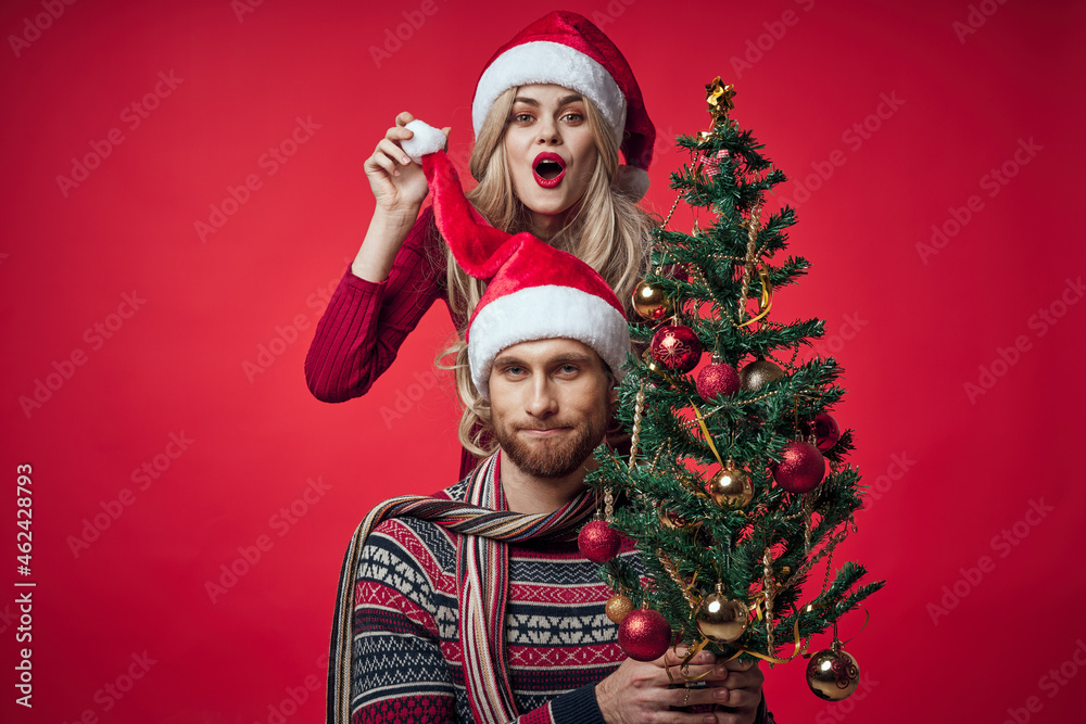 man and woman christmas clothes holiday gift red background man and woman christmas clothes holiday gift red background