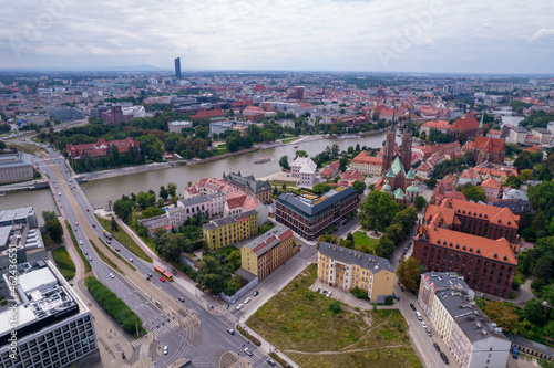 Wrocław, a city in Poland on a sunny and slightly cloudy day. Main Railway Station, Market Square in Wrocław and characteristic places. © Olivier Uchmanski