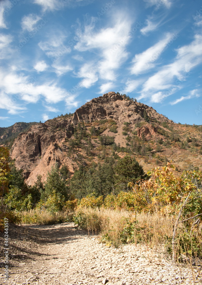 Mountain peak in Cheyenne Canyon Colorado Springs during a fall day with leaves changing color