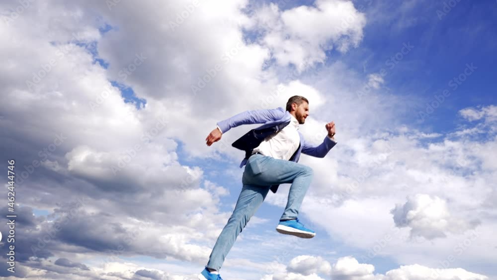 Ambitious man boss in formal suit jump in sky, challenge Ambitious man boss in formal suit jump in sky, challenge