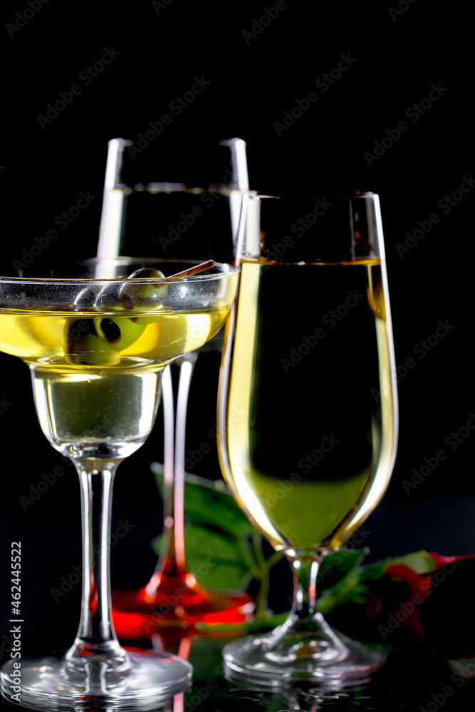 Glasses of wine on a black background. Glasses of wine on a black background.