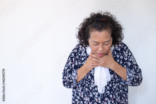 The portrait of an elderly woman is having a sick illness woman coughing