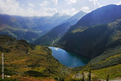 Fototapeta Naklejka Na Ścianę i Meble -  blue mountain lake with a mountain range in the background view from above