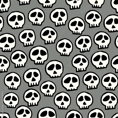 Vector grey and white doodle skulls seamless pattern. Hand drawn, lighthearted and funny design ideal for Halloween . Perfect for fabric, wallpaper, scrapbooking and stationery.