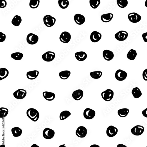 Vector black doodle polka dots on a white background seamless pattern. Hand drawn, fun and lighthearted design. Perfect for fabric, wallpaper, scrapbooking and stationery.