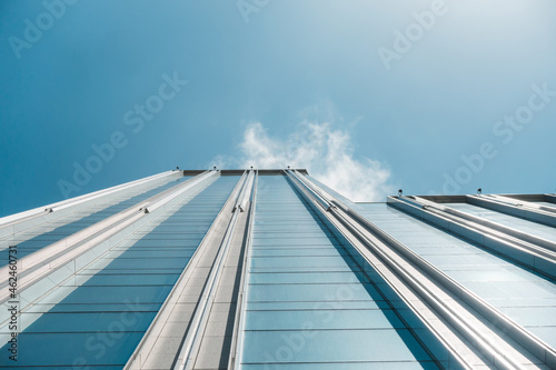 underside panoramic and perspective view to steel blue glass high rise building skyscrapers, business concept of successful industrial architecture © yaophotograph