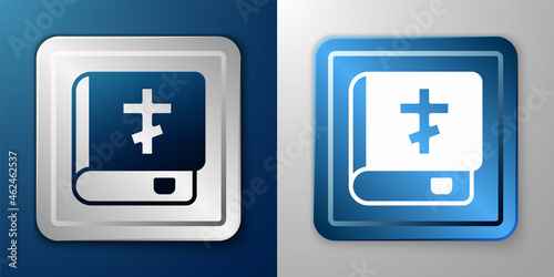 White Holy bible book icon isolated on blue and grey background. Silver and blue square button. Vector