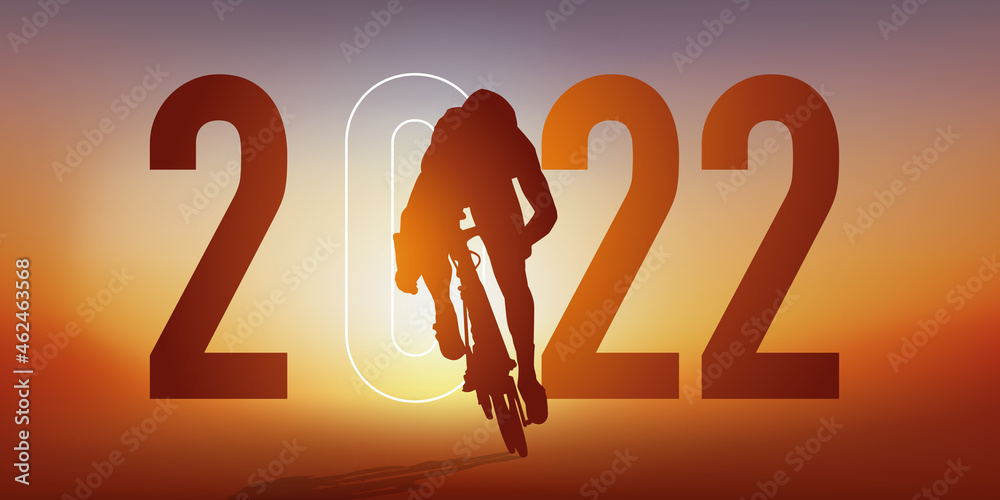 Concept du sport sur le thème du cyclisme pour une carte de vœux 2022, montrant un cycliste qui sprint pour passer la ligne d’arrivée. - obrazy, fototapety, plakaty 