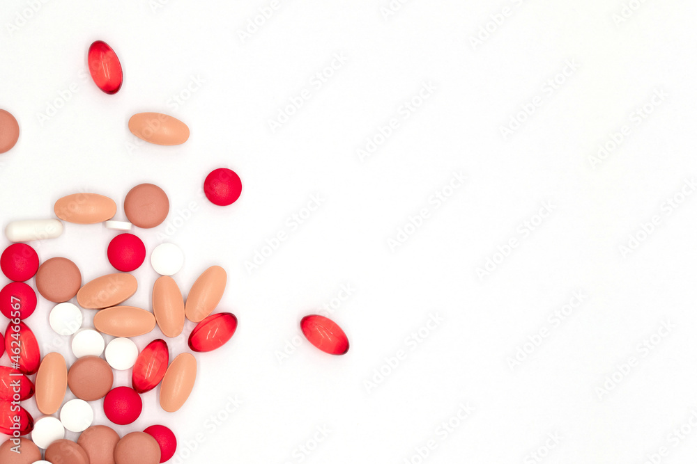 Pharmaceutical industry, pharmacy and healthcare, top view of red, yellow and beige vitamins, pills and capsules, medicines on white background, flat lay with blank space