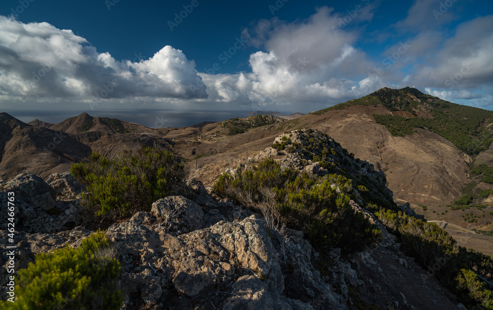 Landscape (peaks, rocks, cliffs, ocean) on the volcano island Porto Santo in the Atlantic Ocean, Terra Cha track, Portugal Landscape (peaks, rocks, cliffs, ocean) on the volcano island Porto Santo in the Atlantic Ocean, Terra Cha track, Portugal