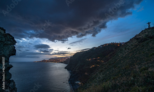 Sunset at Ponta da Garajau with Cristo Rei statue on Madeira, Atlantic Ocean, Portugal