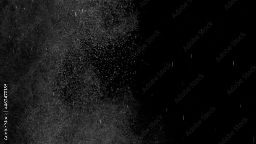 Amazing dance of small drops performed on black background Amazing dance of small drops performed on black background