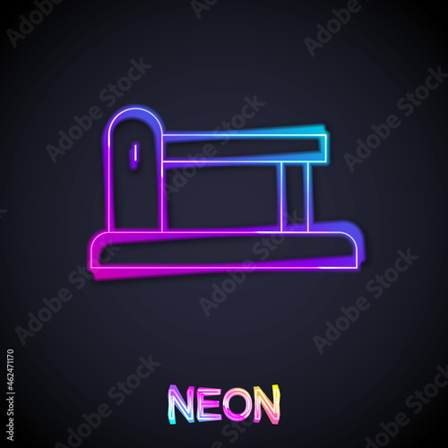 Glowing neon line Railway barrier icon isolated on black background. Vector
