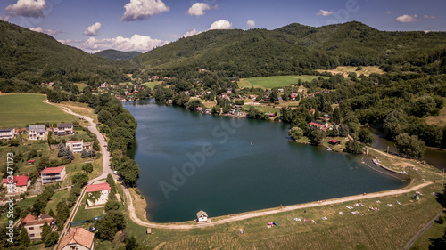 Aerial view of a lake in the village of Bansky Studenec in Slovakia photo