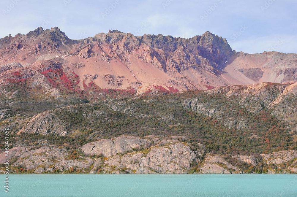Colorful volcanic mountain by the lake. Los huemules park.