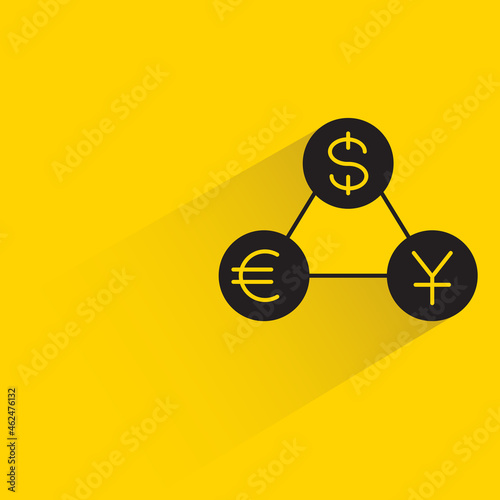 money currency with shadown on yellow background photo