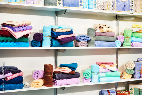 Colored terry towels on a shelf