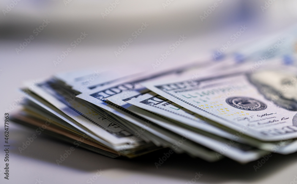 One hundred 100 american dollars bills background. Pile of USA banknotes. Heap of american money background. Hundred dollar bills One hundred 100 american dollars bills background. Pile of USA banknotes. Heap of american money background. Hundred dollar bills