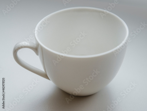 a cup of coffee on wood background