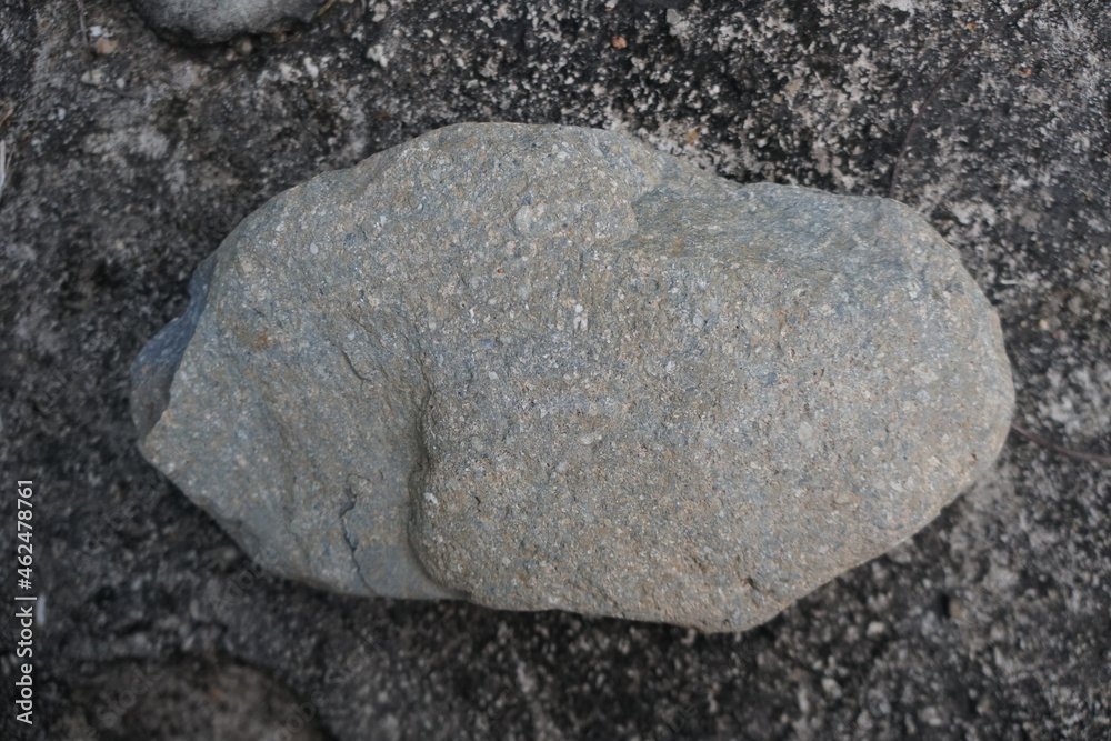 Raw specimen of andesite extrusive volcanic rock in the nature. Raw specimen of andesite extrusive volcanic rock in the nature.