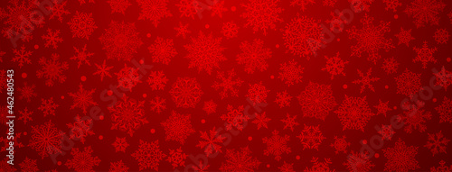 Christmas background of big and small complex snowflakes in red colors © Olga Moonlight