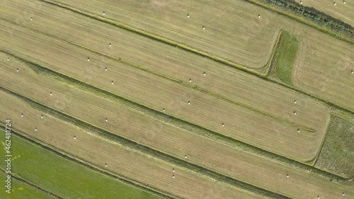 Hay bales on farmland from above photo