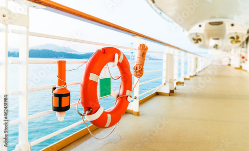 Life buoy on deck of cruise ship photo