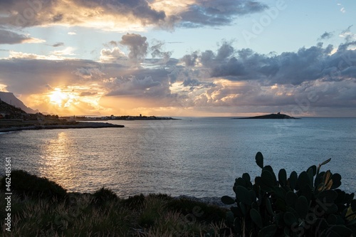 Tramonto con nubi a Isola delle Femmine in Sicilia photo