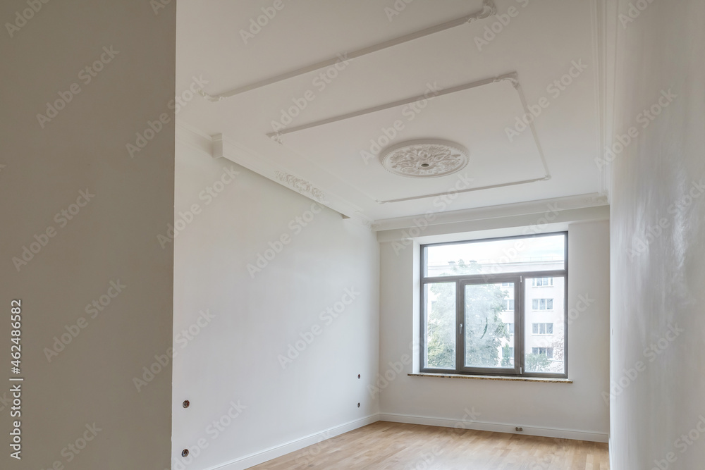 Fototapeta premium empty white room with repair and without furniture. room for office or store