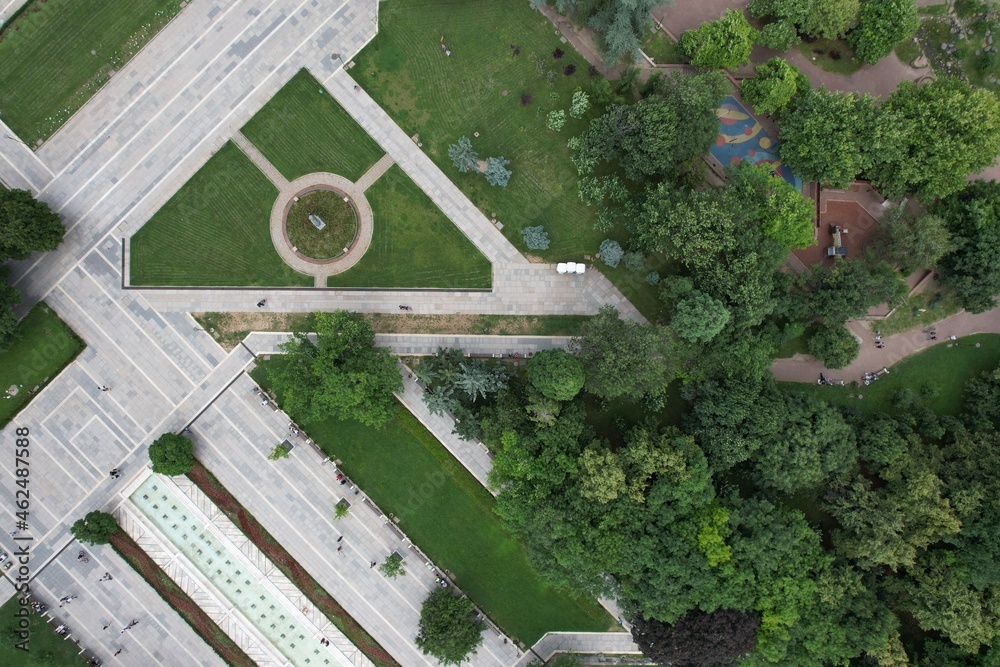 Urban park with meadow, trees and paths. Top view